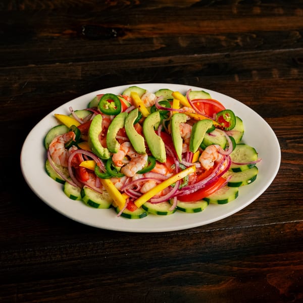 El Tarasco Restaurant Mooney's shrimp ceviche with avocado, cucumber, tomato, red onion, and jalapeño.