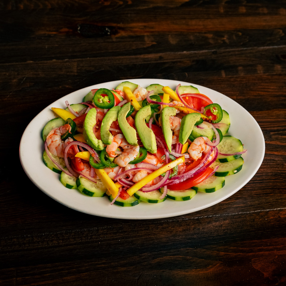 El Tarasco Restaurant Mooney's shrimp ceviche with avocado, cucumber, tomato, red onion, and jalapeño.